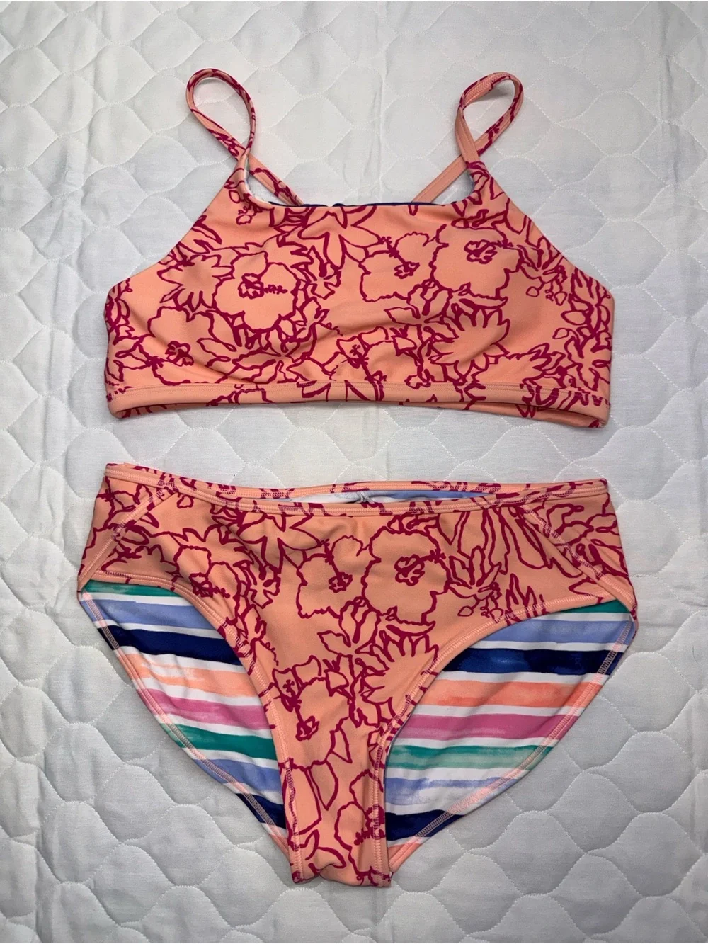 This Athleta Girl reversible bikini set high neck top and mid-rise bottoms